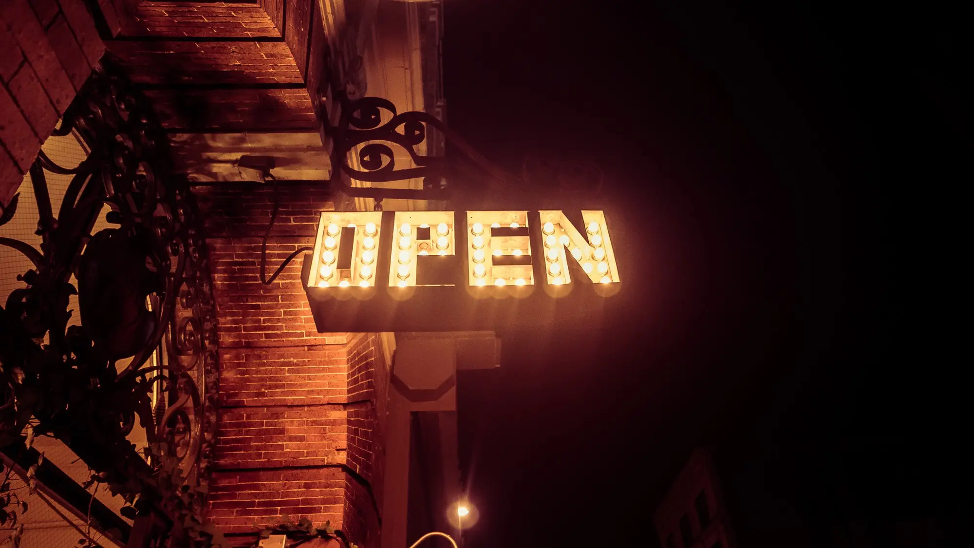 Storefront Lettering Night 13 Storefront Design Ideas to Boost Foot Traffic 2026